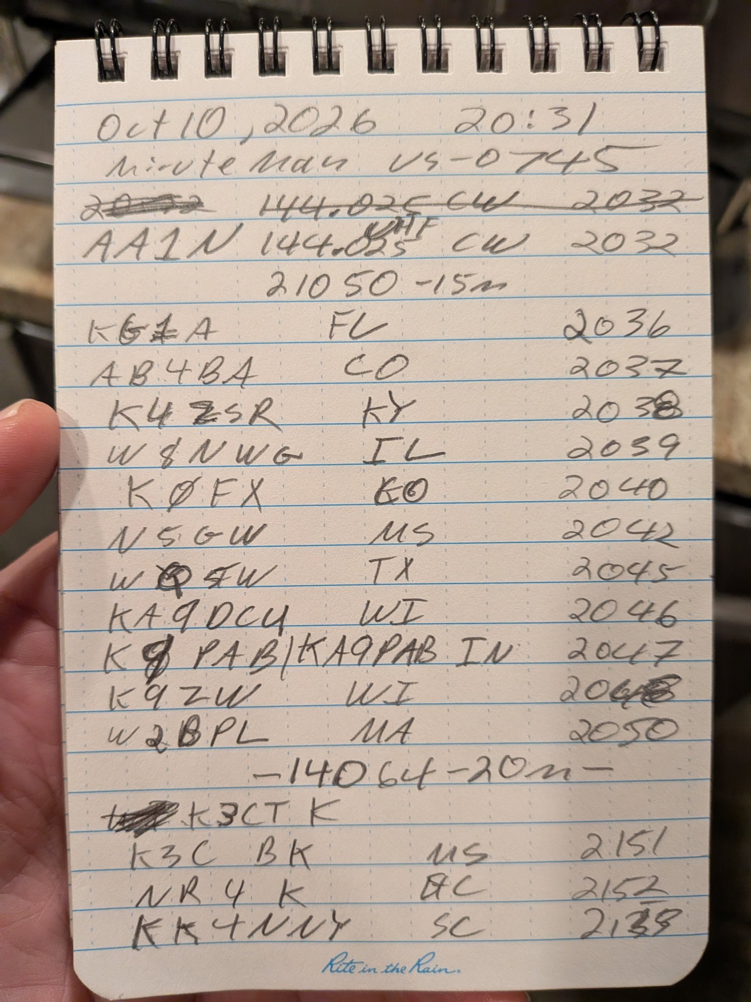 My handwritten Rite in the Rain log page from October 10, 2026, with 2 meter, 15 meter and 20 meter contacts