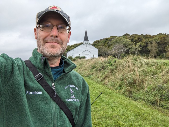 Selfie - the author with Peddocks Island, base church in the background